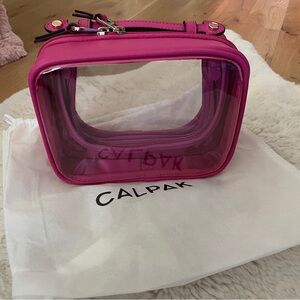 EUC Calpak Small Clear Cosmetics Case Dragonfruit